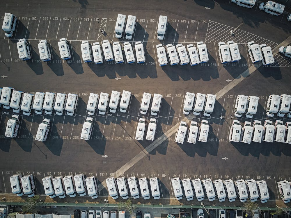Eco-Friendly Fleet Management; https://www.pexels.com/photo/identical-vehicles-in-parking-area-9716362/