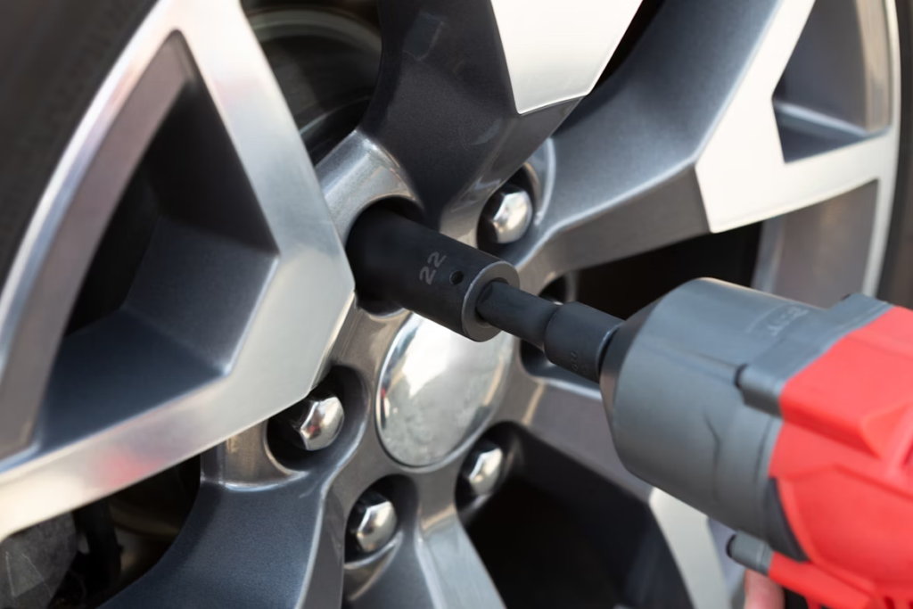 Tire repair; Image source:https://unsplash.com/photos/black-and-silver-car-wheel-O_ufcLVTAYw